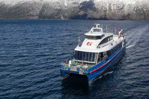 What should a boat do when meeting a ferry?