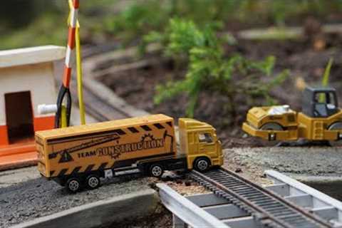 Toy Train - Truck Cars Pass The Railroad Tracks